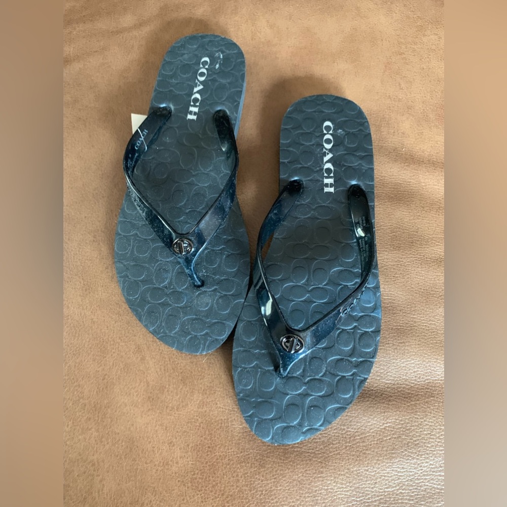 Brand new, never worn — COACH flip flop
size 7/8